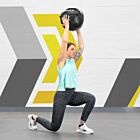 Female athlete performing core exercise with wall ball